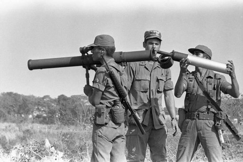 A U.S. military advisor training Salvadoran soldiers Ilopango Military Base, Ilopango, 1983