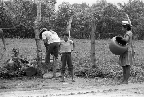 Transporting clay goods, La Chamba, Colombia, 1975