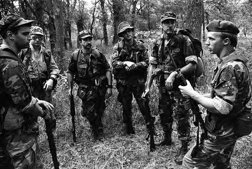 Survival school students await instructions, Liberal, 1982