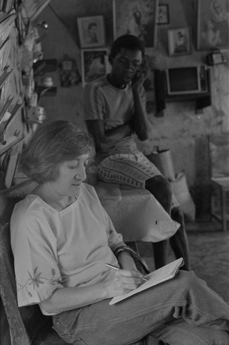 Nina S. de Friedemann taking notes, San Basilio del Palenque, ca. 1978