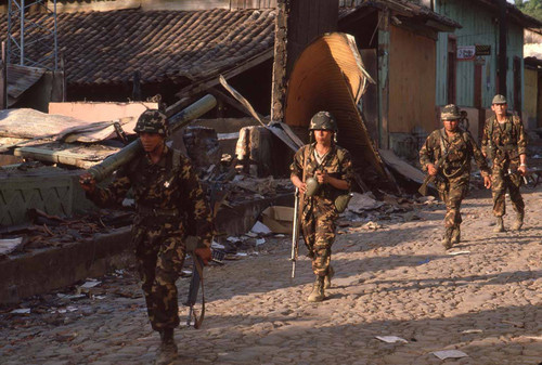 Salvadoran soldiers in reclaimed town, San Agustín, 1983
