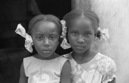 Two girls posing for a portrait, San Basilio de Palenque, 1976