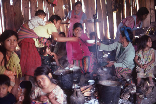 Guatemalan refugees cook, Cuauhtémoc, 1983