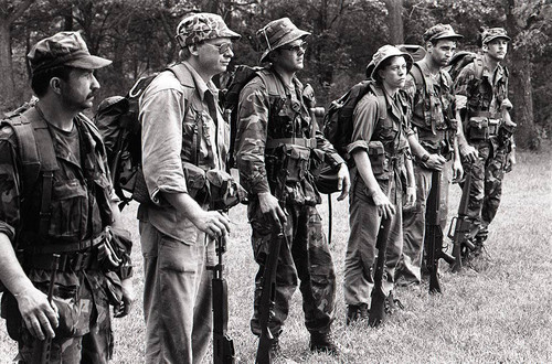 Survival school students form a military-style lineup, Liberal, 1982