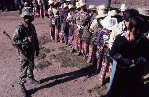 Mayan men in line to vote, Nahualá, 1982