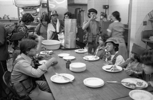 Sandinistas eat at a hotel, Managua, 1979