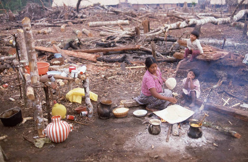 Guatemalan refugees cooking, Chajul, 1983