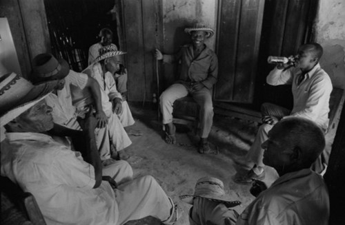 Men gather, San Basilio de Palenque, Colombia, 1977