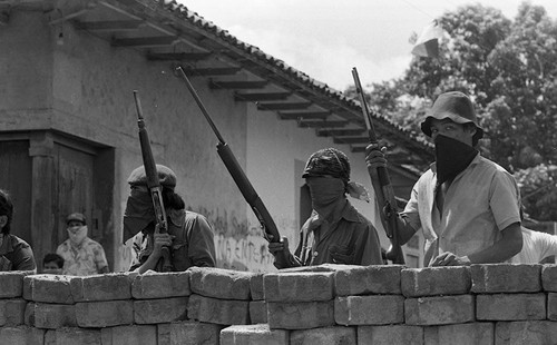 Sandinistas behind a barricade, Nicaragua, 1979