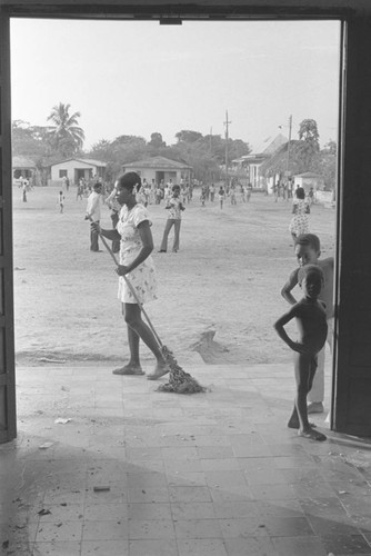 Woman sweeping the floor, San Basilio de Palenque, 1976