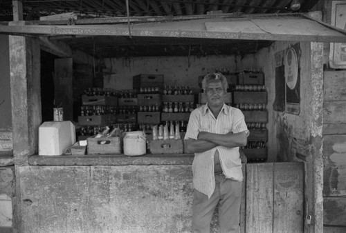 Man selling drinks at city market, Cartagena Province, ca. 1978