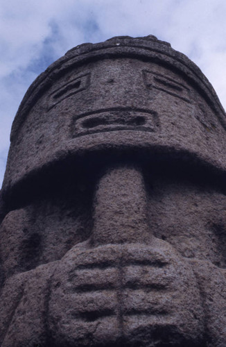 Stone statue with a mask-like face, San Agustín, Colombia, 1975