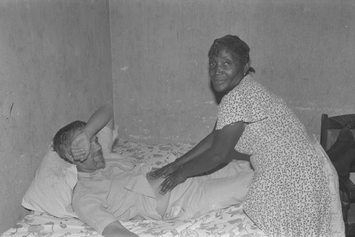 Woman giving a massage to a visitor, San Basilio de Palenque, ca. 1978