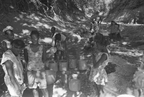 Girls collecting water at river, San Basilio de Palenque, ca. 1978