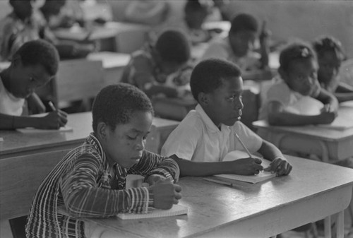 Students in a classroom sitting at their desk, San Basilio de Palenque, ca. 1978