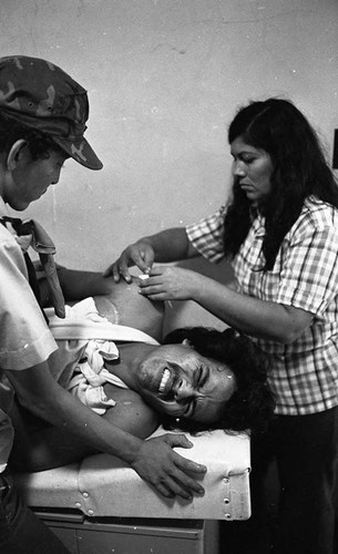 Injured man in high security prison, Nicaragua, 1980