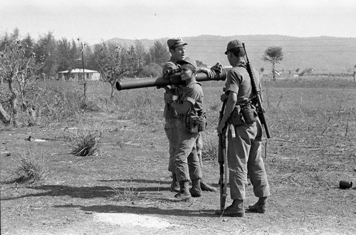 U.S. advisor training Salvadoran soldiers at military base, Ilopango, 1983