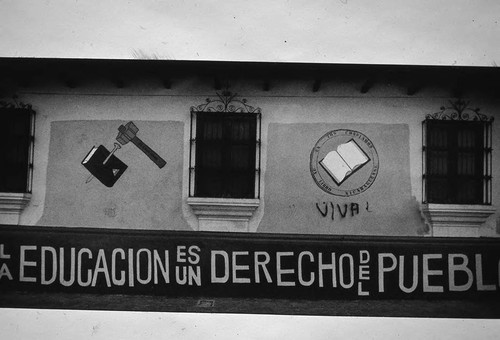 Building with sign and murals, Nicaragua, 1979