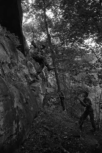 Survival school students learn to rappel, Liberal, 1982