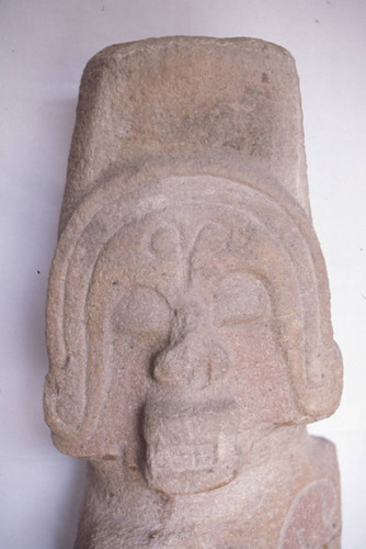 Stone statue with a v-shaped chest mark, close-up, San Agustín, Colombia, 1975