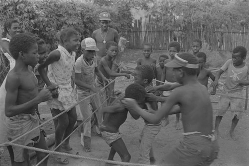 Children boxing inside ring, San Basilio del Palenque, ca. 1978