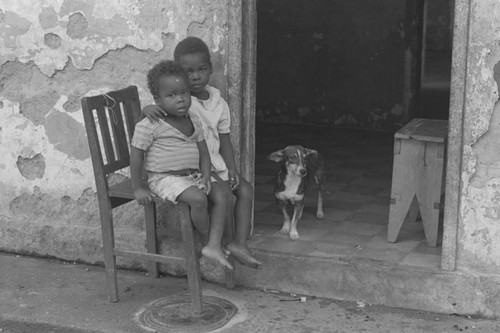 Two young boys and a dog, Barbacoas, Colombia, 1979