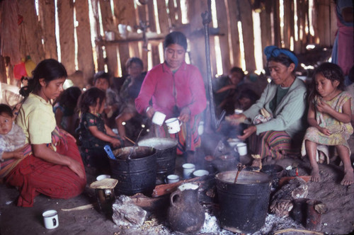 Guatemalan refugees serve food, Cuauhtémoc, 1983