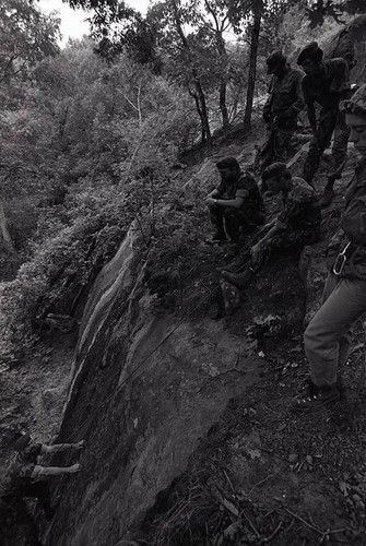 Claflin demonstrates rock climbing, Liberal, 1982