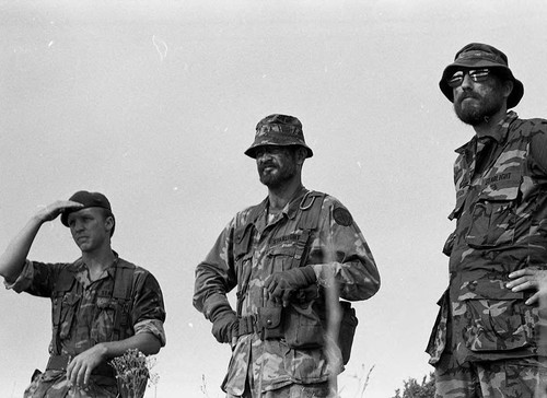 Survival school instructor and assistants, Liberal, 1982