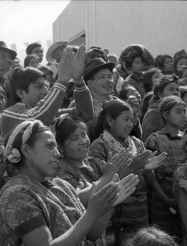 Mayan people cheering at a campaign rally, Guatemala City, 1982