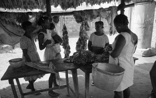 Women selling and buying meat, San Basilio de Palenque, 1976