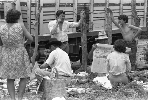 Wrapping clay pieces, La Chamba, Colombia, 1975