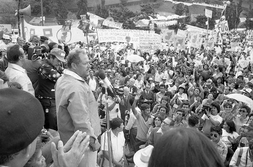 A crowd cheers for Guevara, Guatemala City, 1982