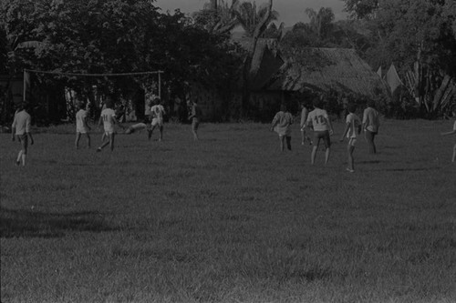 Youth playing soccer, La Chamba, Colombia, 1975