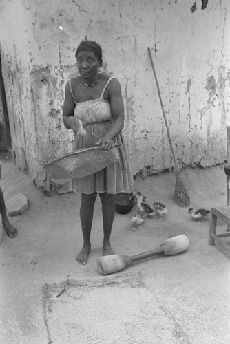 Woman sifting corn, San Basilio del Palenque, ca. 1978