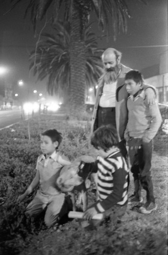 Man with children, Mexico City, 1982