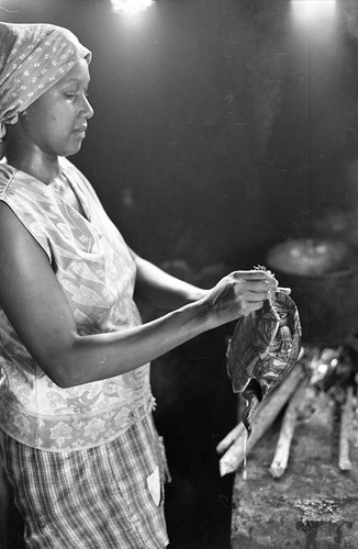 Anselma Salas cooking a turtle, San Basilio de Palenque, 1977