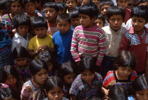 School children huddle together, Zaragoza, 1982