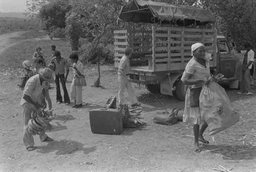 Nina S. de Friedemann getting off from a truck, Cartagena Province, ca. 1978