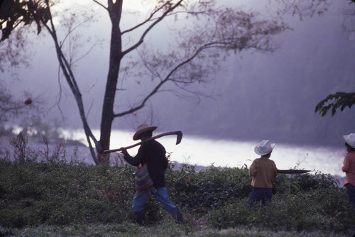 Guatemalan man and children near a refugee camp, Ixcán, 1983