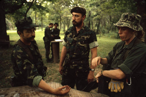 Survival school students learn first aid techniques, Liberal, 1982