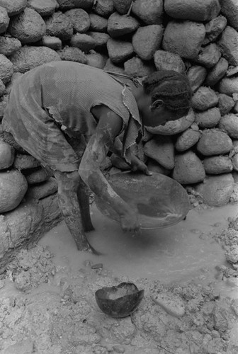 A girl in the mud, Barbacoas, Colombia, 1979