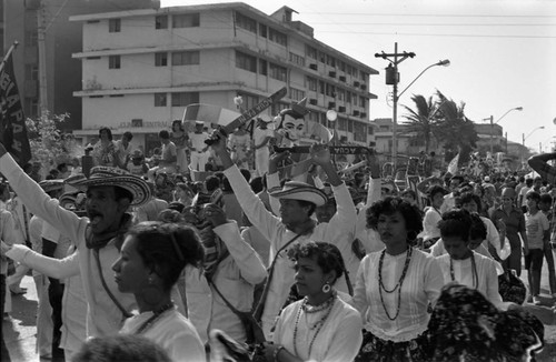 Dancers walking in the street Barranquilla, Colombia, 1977