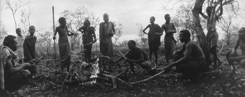 Villagers at an outdoor fire, Tanzania, 1979