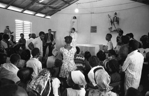 Priest preparing to celebrate a baptism, San Basilio de Palenque, 1975