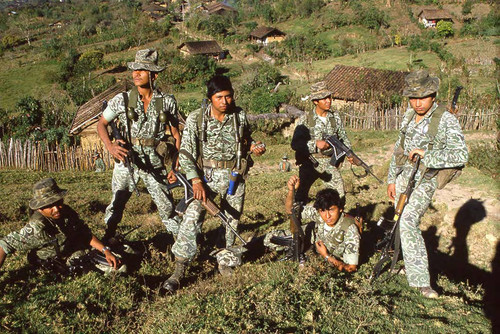 Soldiers stand on mountainous terrain while on patrol, Chajul, 1982