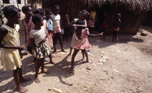 Girls boxing outdoors, San Basilio de Palenque, 1976