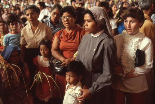 Women and children attending a memorial, San Salvador, El Salvador, 1982