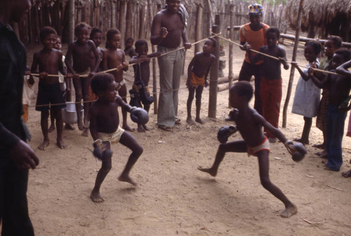 Children boxing inside ring, San Basilio de Palenque, 1976