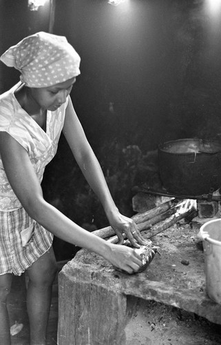 Anselma Salas cooking a turtle, San Basilio de Palenque, 1977